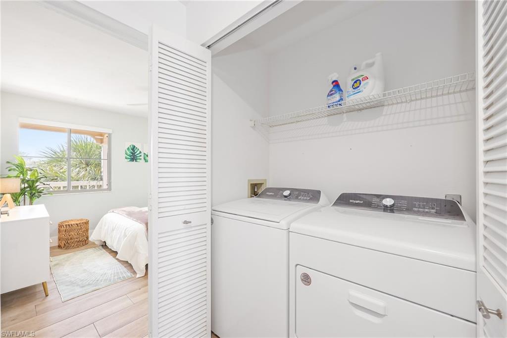 2711 Citrus Lake Drive, Unit F305 Naples, FL 34109 - Photo 34 of 50 a utility room with dryer and washer