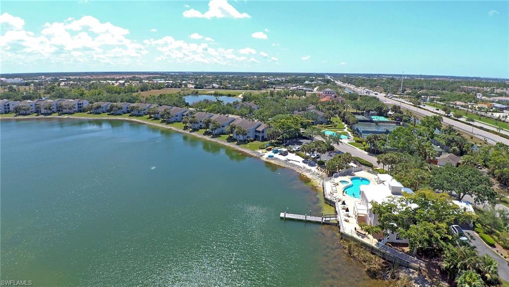 2711 Citrus Lake Drive, Unit F305 Naples, FL 34109 - Photo 38 of 50 an aerial view of a city with a lake view