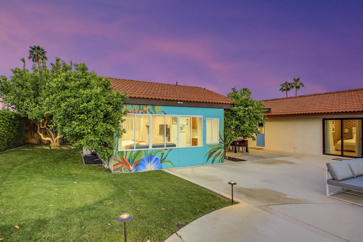 2230 Tamarisk Road Palm Springs, CA 92262 - Photo 11 of 66 a view of a house with a backyard and a yard