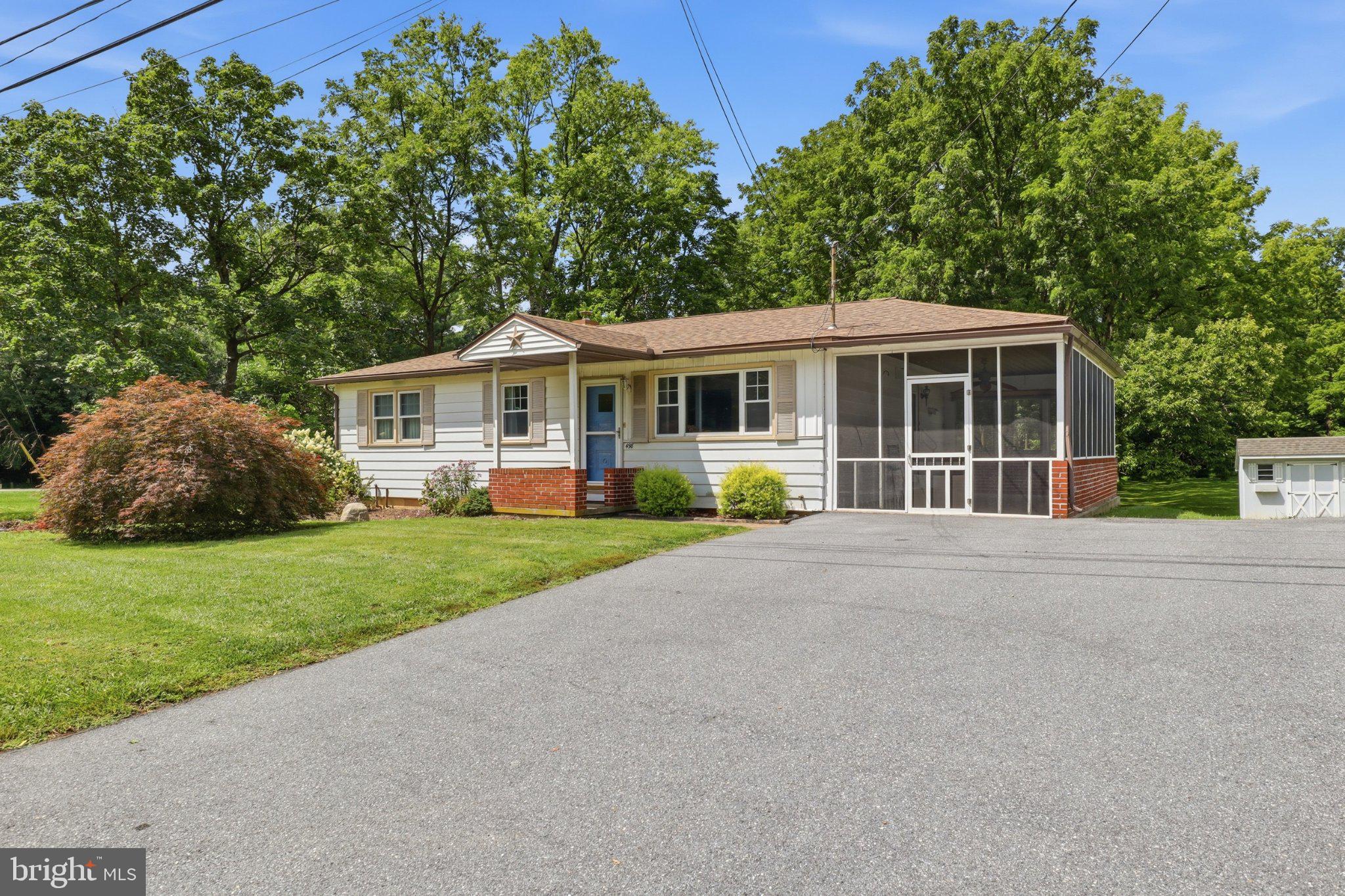 498 Middletown Road Hummelstown, PA 17036 - Photo 1 of 39 Charming home nestled in lush greenery.