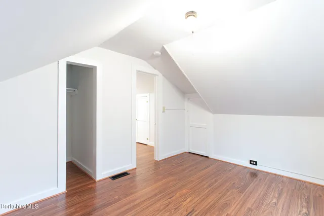 a view of a big room with a black white checkered floor and a black white checkered floor