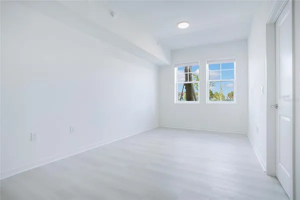an empty room with windows