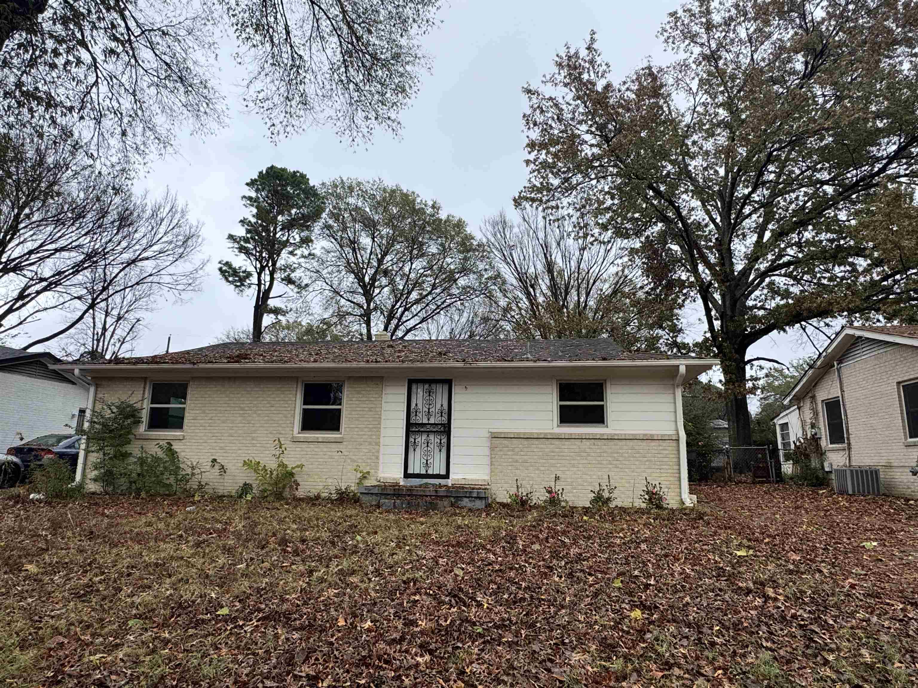 1220 South White Station Road Memphis, TN 38117 - Photo 1 of 1 a front view of house with yard and trees
