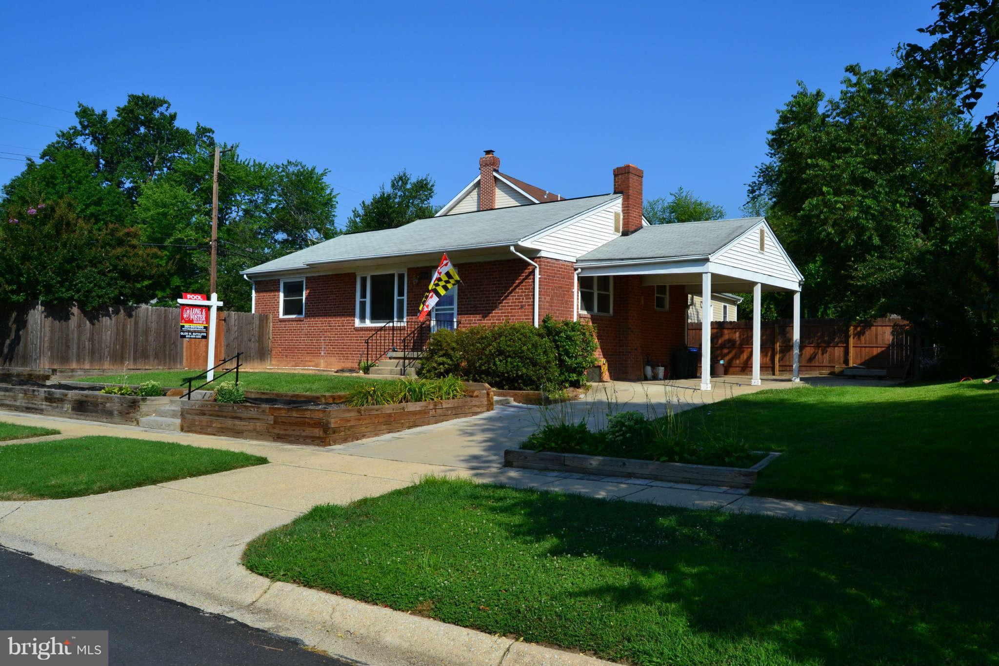 423 Belton Road Silver Spring, MD 20901 - Photo 1 of 28 a front view of a house with a yard