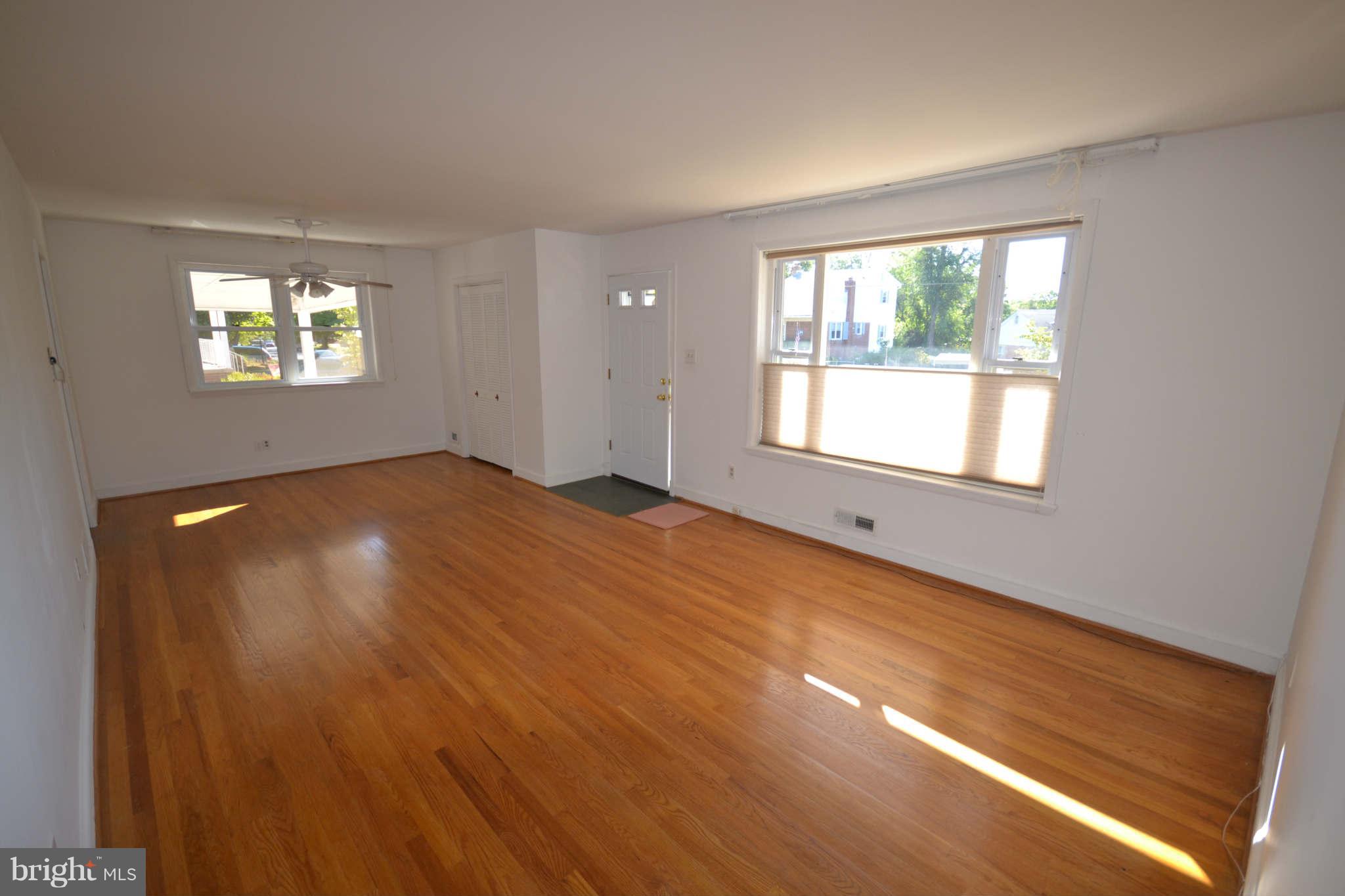 423 Belton Road Silver Spring, MD 20901 - Photo 13 of 28 a view of an empty room with a window
