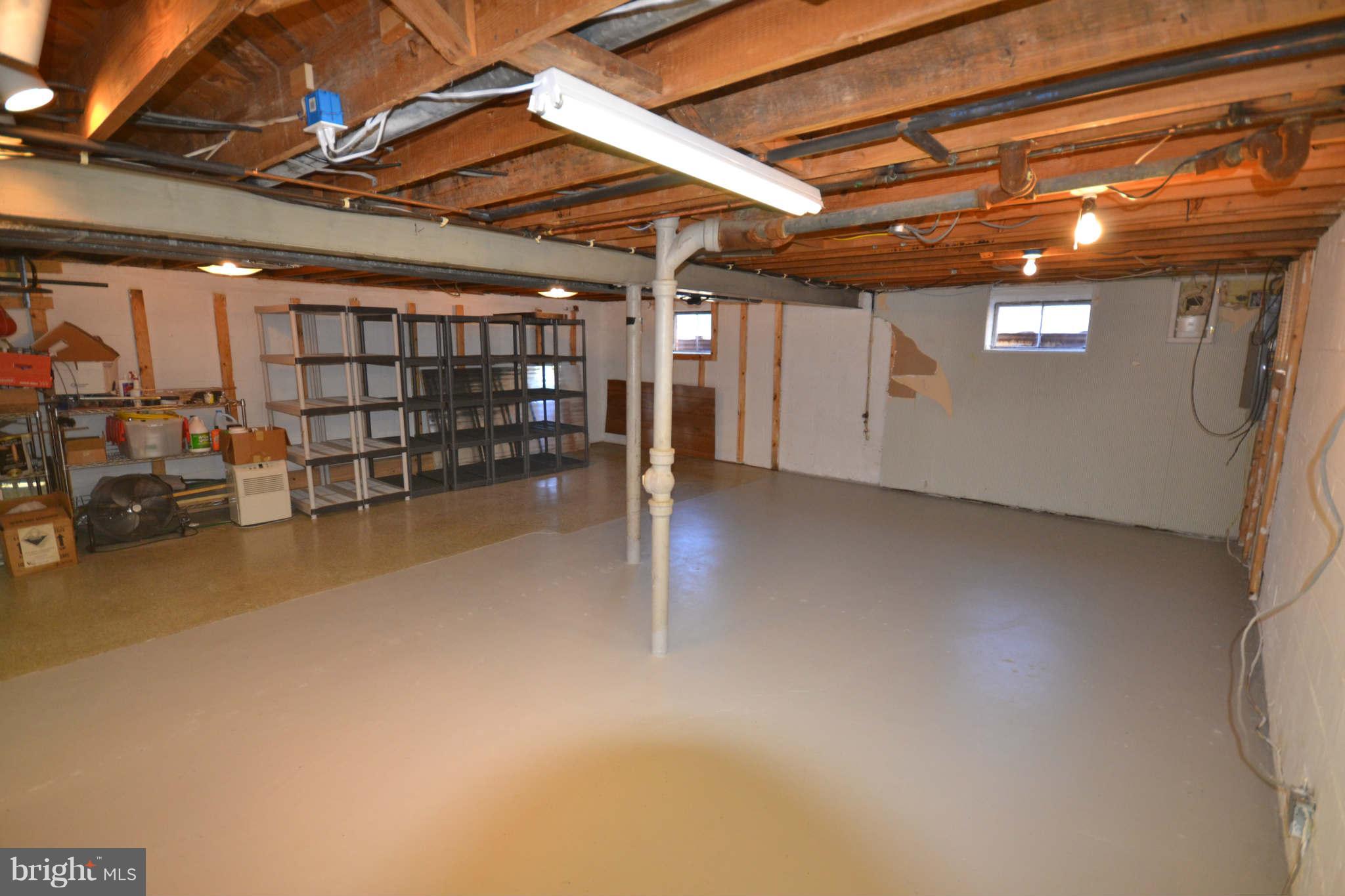423 Belton Road Silver Spring, MD 20901 - Photo 24 of 28 a view of empty room with wooden ceiling