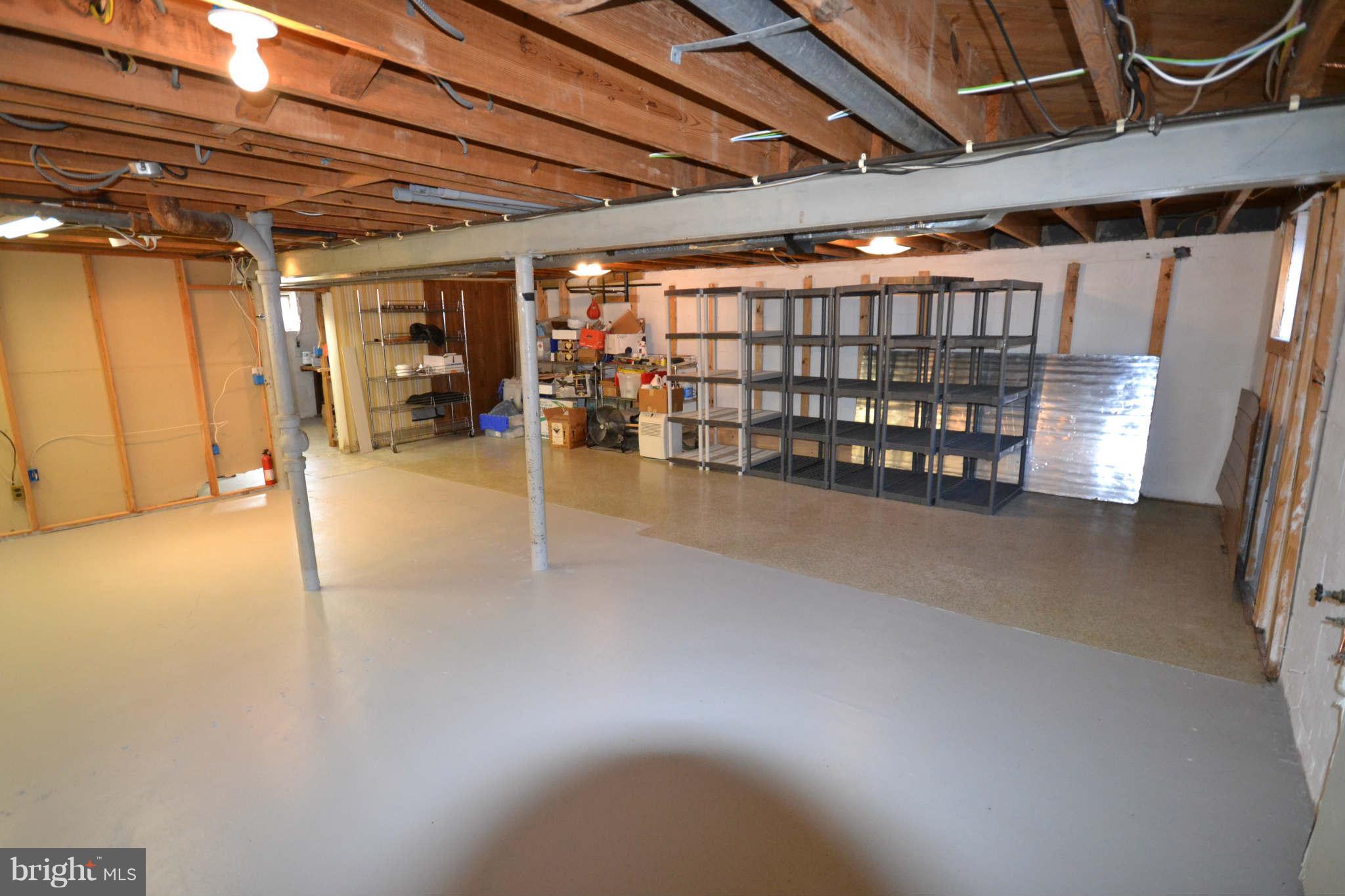 423 Belton Road Silver Spring, MD 20901 - Photo 25 of 28 a view of an empty room with a couch