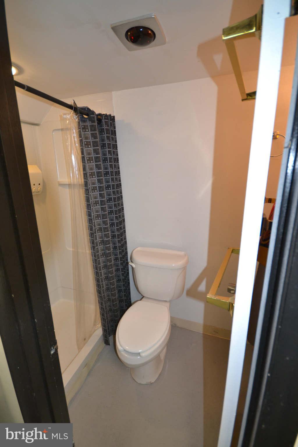 423 Belton Road Silver Spring, MD 20901 - Photo 28 of 28 a white toilet sitting next to a sink