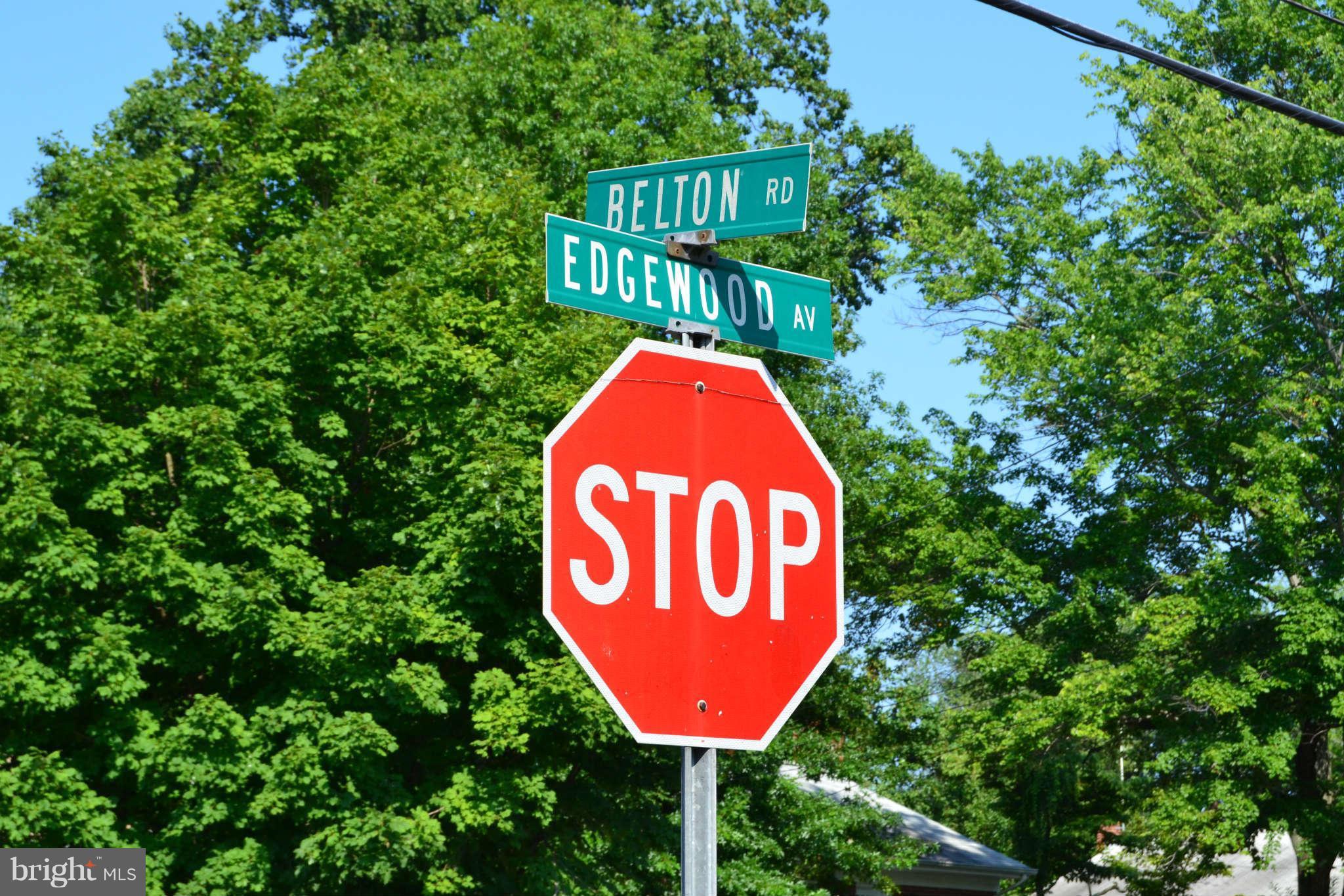 423 Belton Road Silver Spring, MD 20901 - Photo 10 of 28 a view of a sign board with a tree