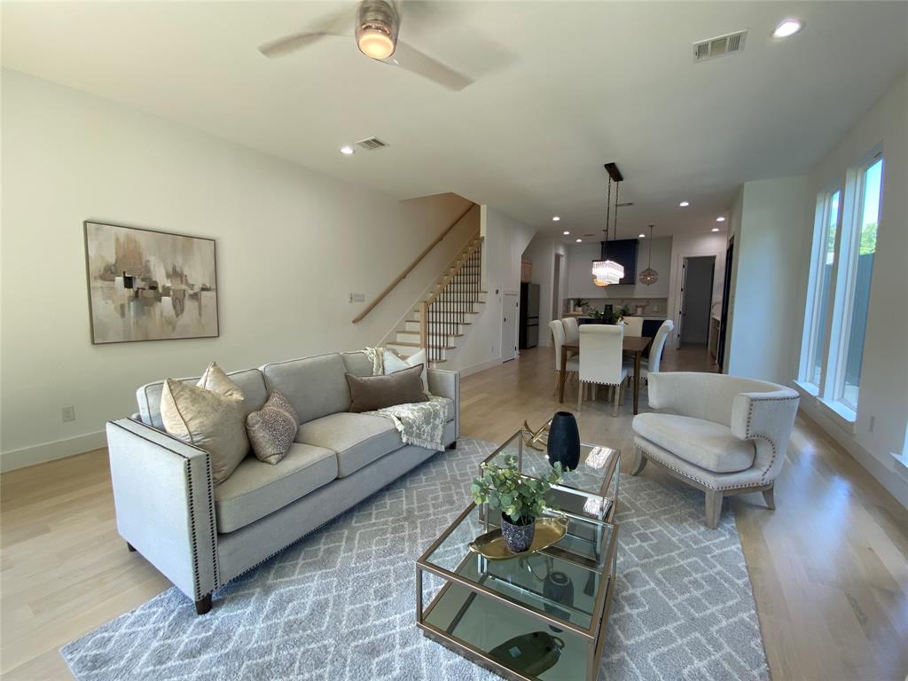 807 South Glasgow Drive Dallas, TX 75223 - Photo 9 of 25 a living room with furniture and wooden floor