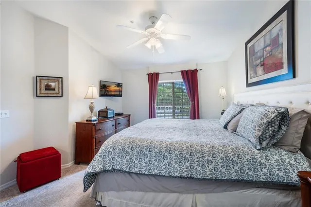 a bedroom with a bed and dresser