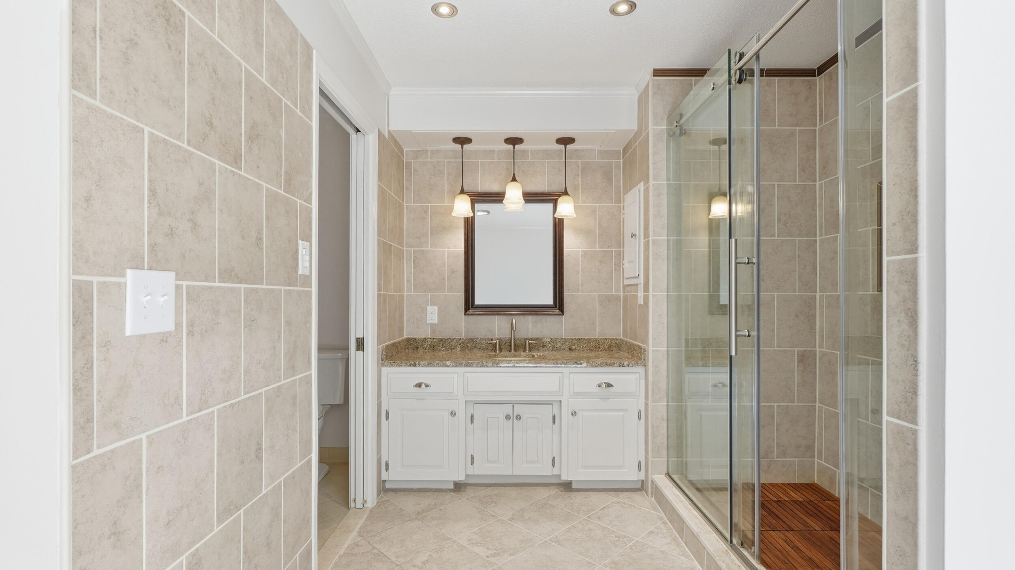 755 Golf View Drive Northwest Cleveland, TN 37312 - Photo 21 of 49 a bathroom with a shower sink and mirror