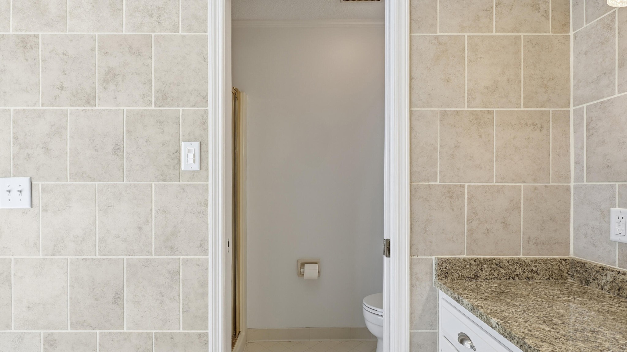 755 Golf View Drive Northwest Cleveland, TN 37312 - Photo 23 of 49 a bathroom with a granite countertop shower and a sink
