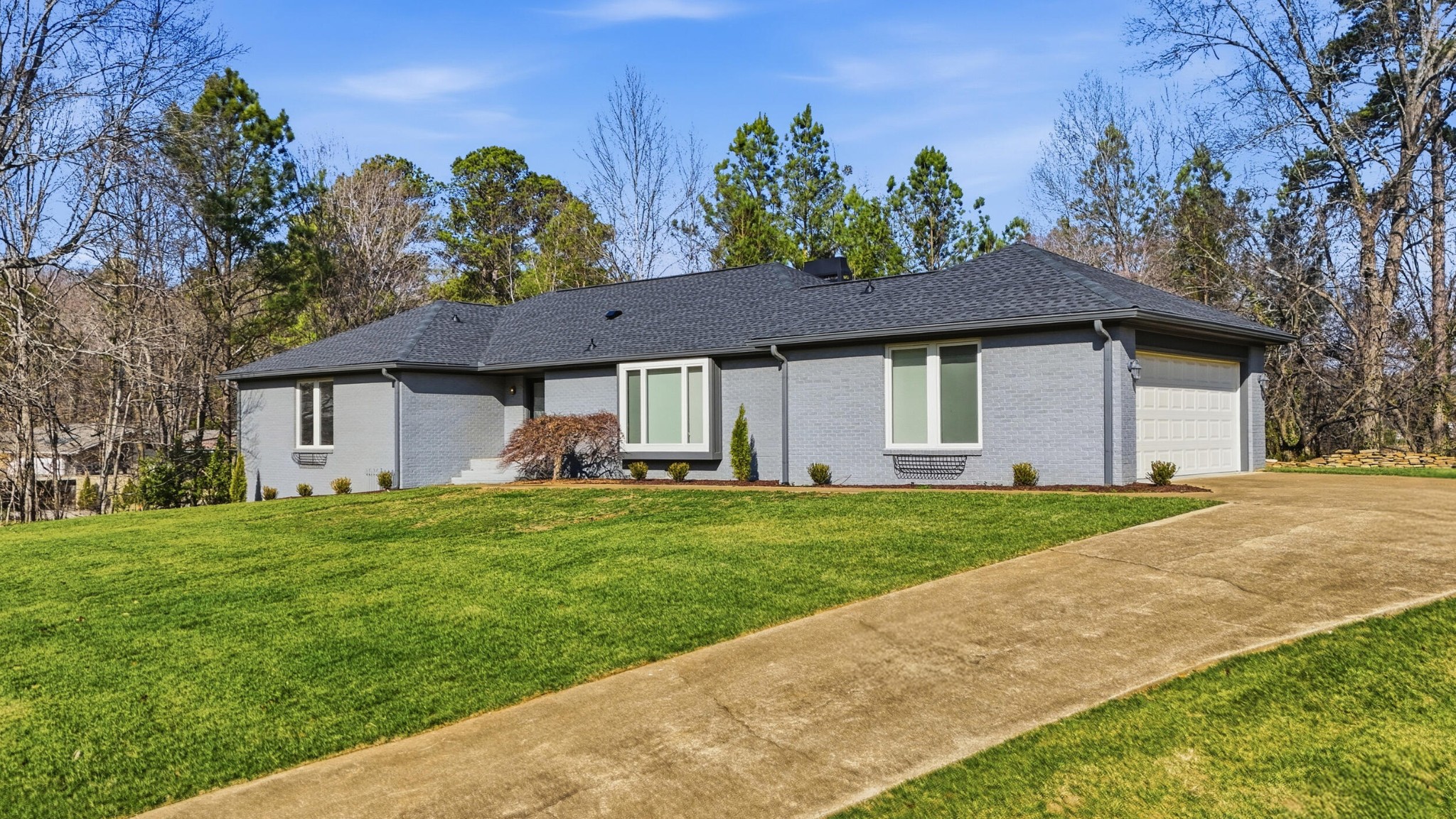 755 Golf View Drive Northwest Cleveland, TN 37312 - Photo 3 of 49 a front view of a house with garden