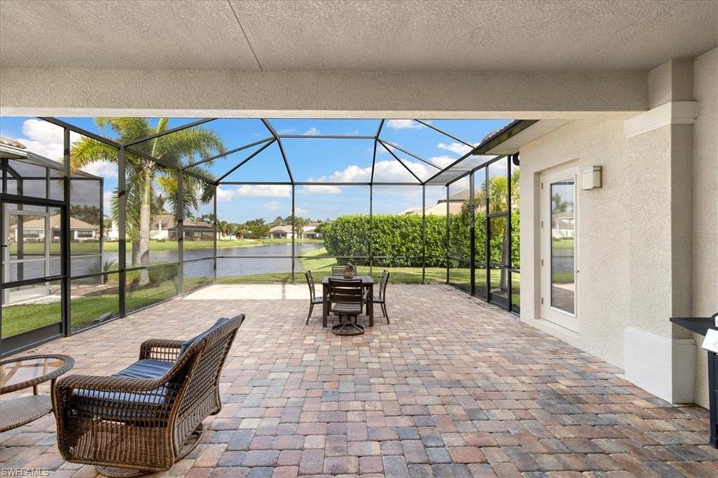 1509 Serrano Circle Naples, FL 34105 - Photo 18 of 24 a view of outdoor space with seating