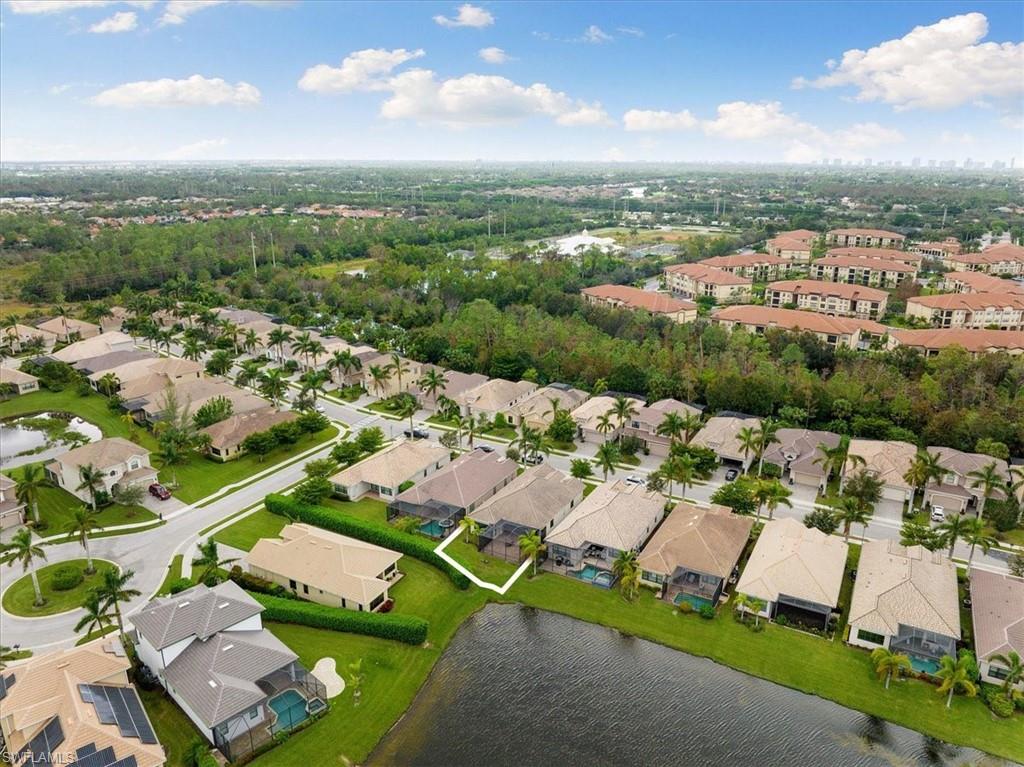 1509 Serrano Circle Naples, FL 34105 - Photo 21 of 24 an aerial view of residential houses with outdoor space