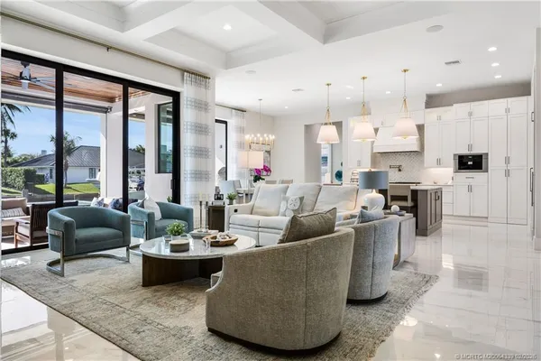 a kitchen with stainless steel appliances a white stove top oven and cabinets