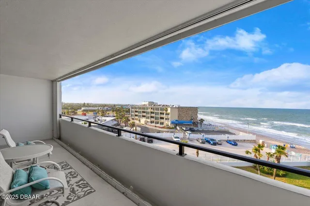 a bedroom with a bed and a lamp