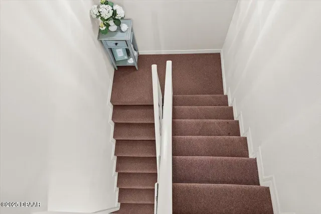 a bathroom with a sink a mirror and a shower