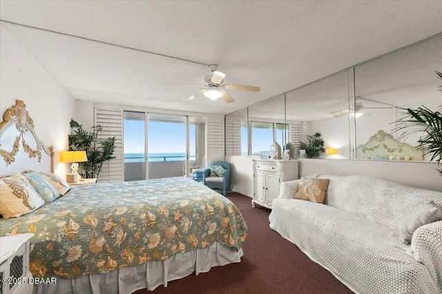 a view of a balcony with a patio