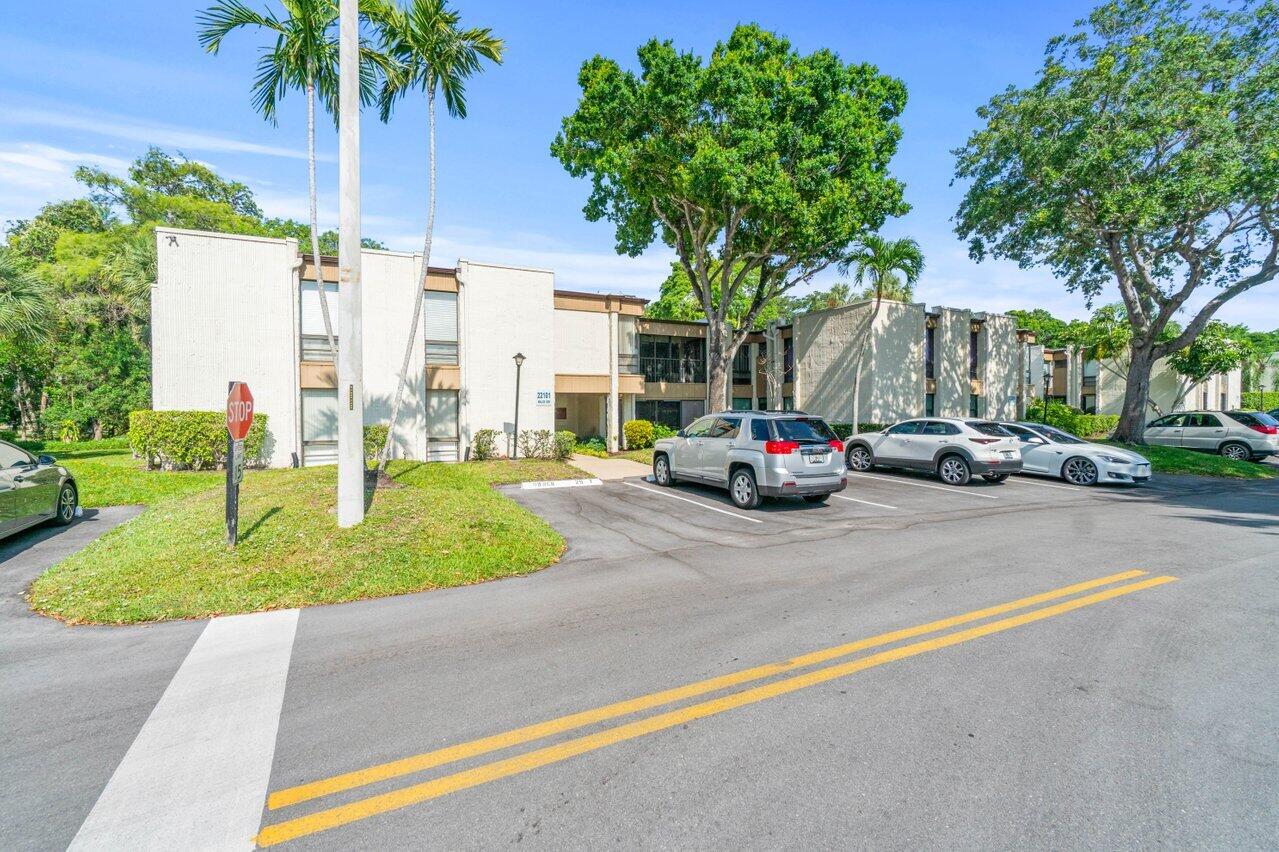 22101 Cocoa Palm Way, Unit 157 Boca Raton, FL 33433 - Photo 1 of 31 a car parked on the side of the road