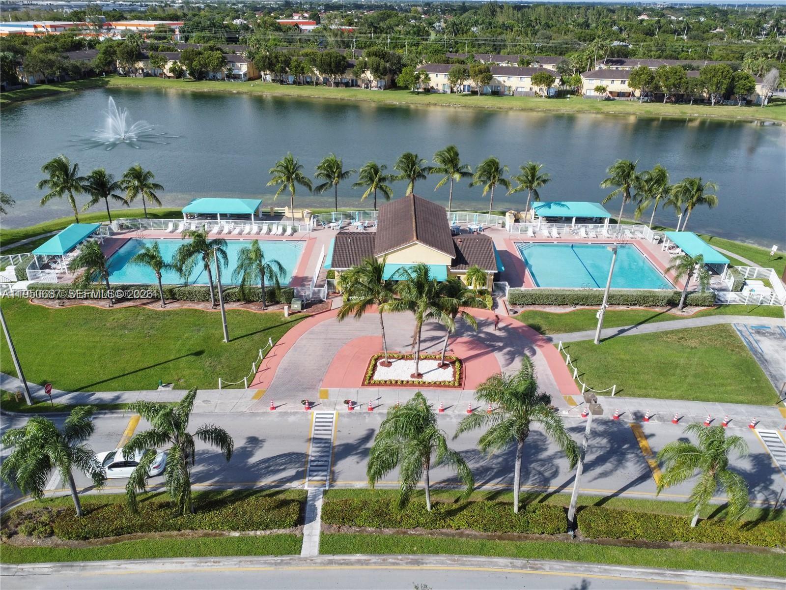 2903 Southeast 17th Avenue, Unit 209 Homestead, FL 33035 - Photo 5 of 30 an aerial view of a house with outdoor space and lake view