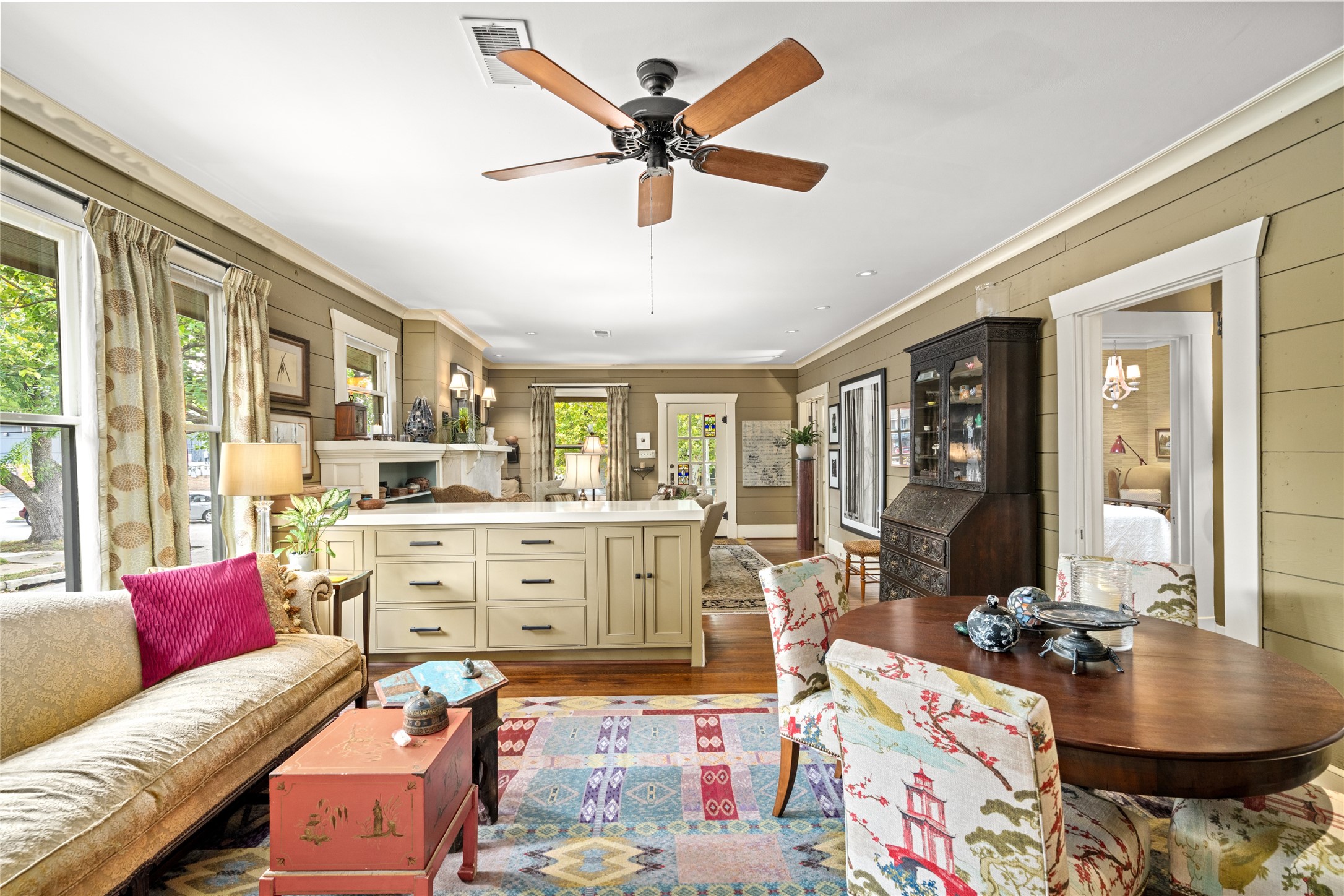 4502 Stanford Street Houston, TX 77006 - Photo 14 of 39 a living room with furniture and a large window with garden view