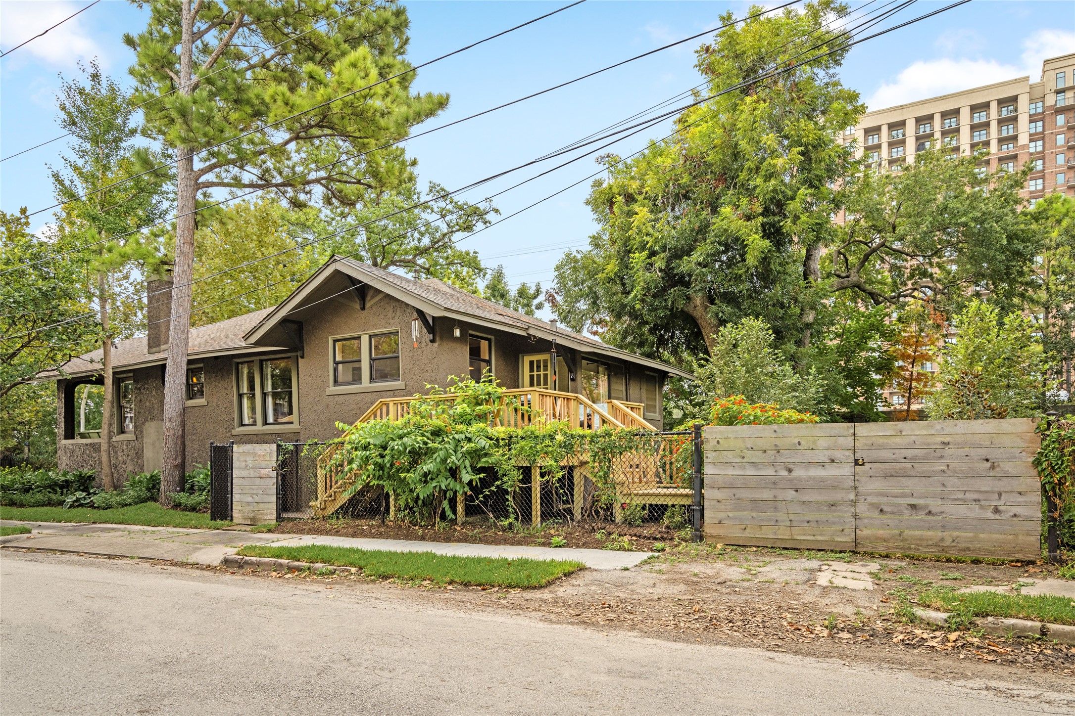 4502 Stanford Street Houston, TX 77006 - Photo 3 of 39 a front view of a house with a yard and garage