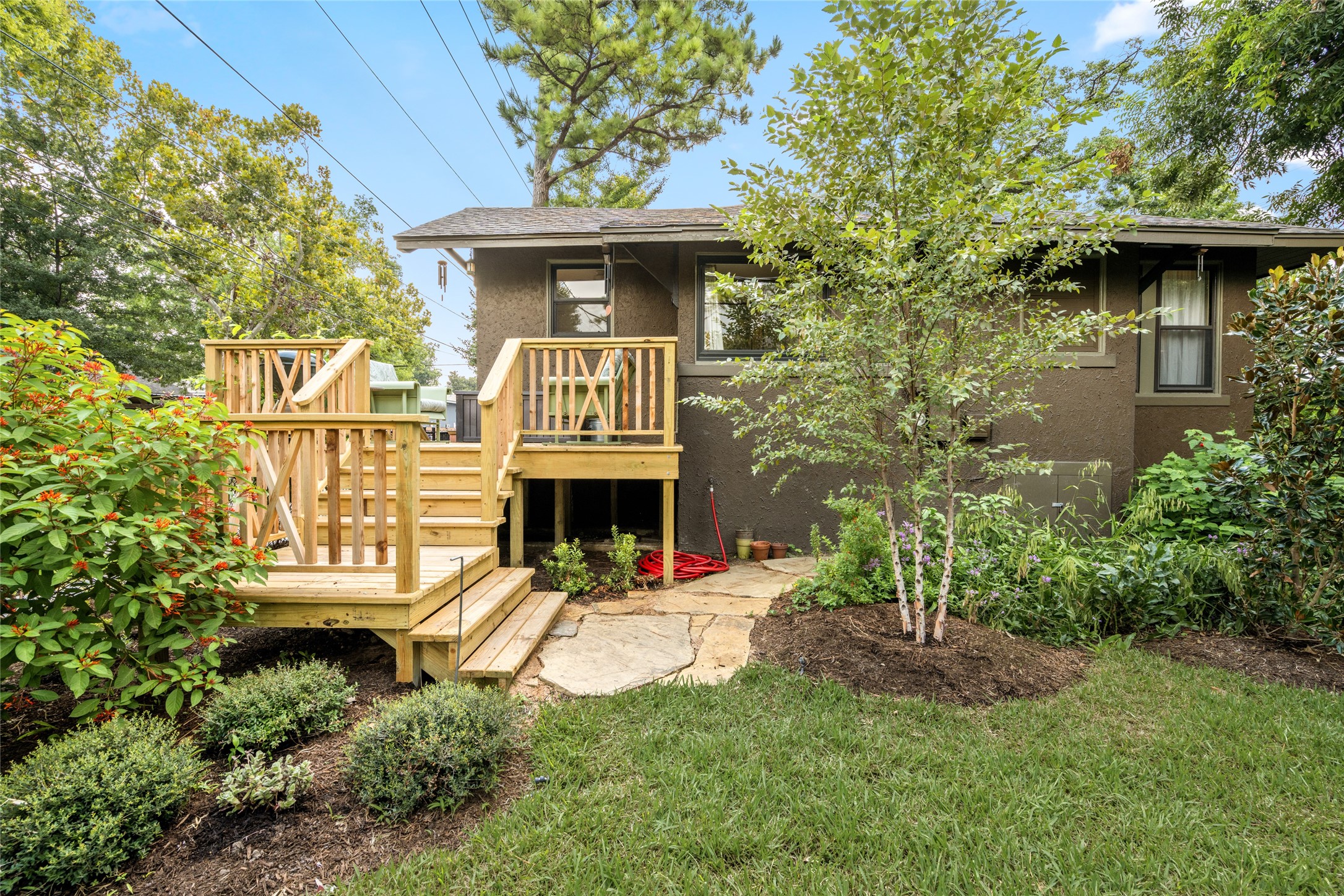 4502 Stanford Street Houston, TX 77006 - Photo 35 of 39 a view of front of a house with a small yard