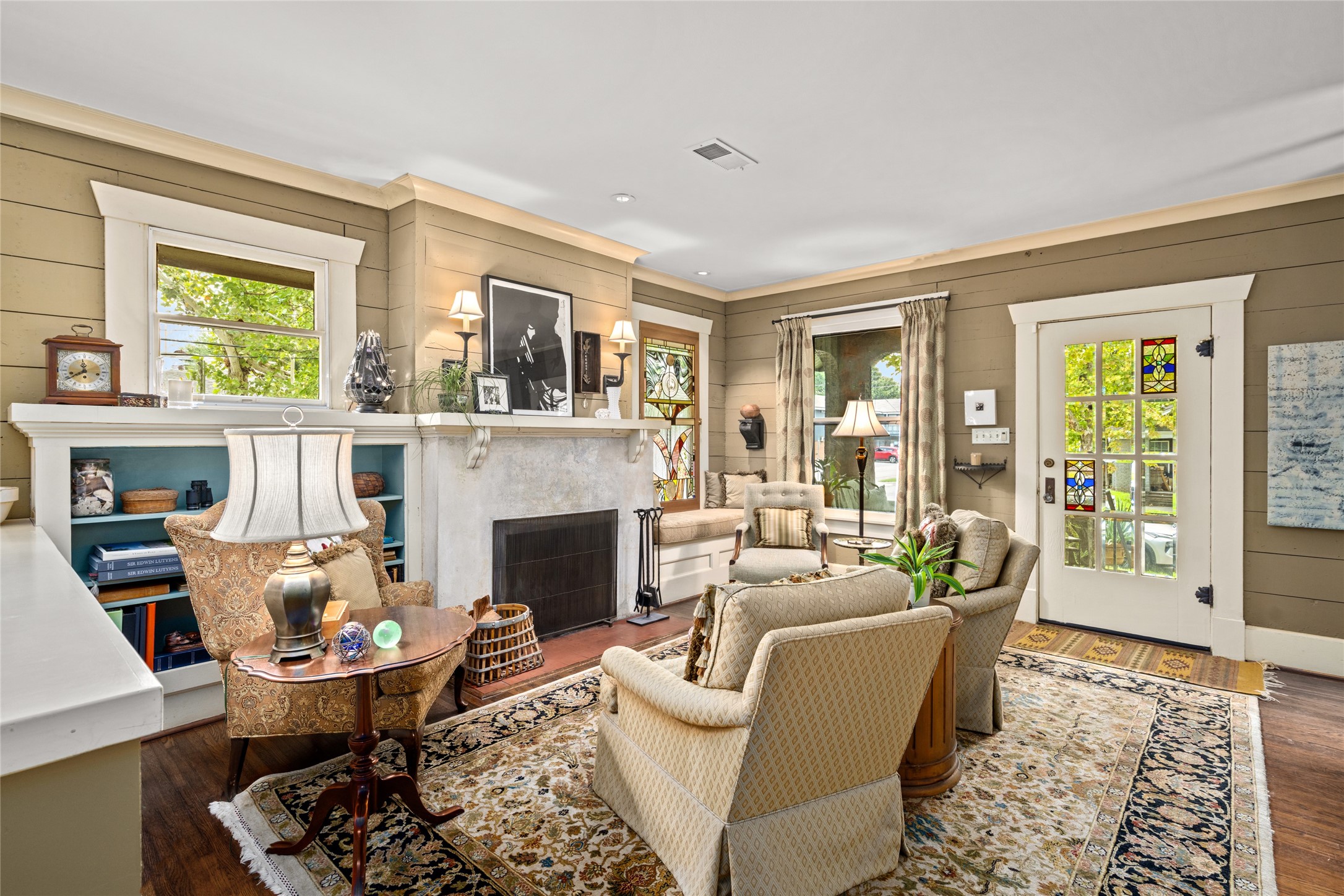 4502 Stanford Street Houston, TX 77006 - Photo 10 of 39 a living room with furniture fireplace and a window