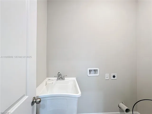 a bathroom with a sink and mirror