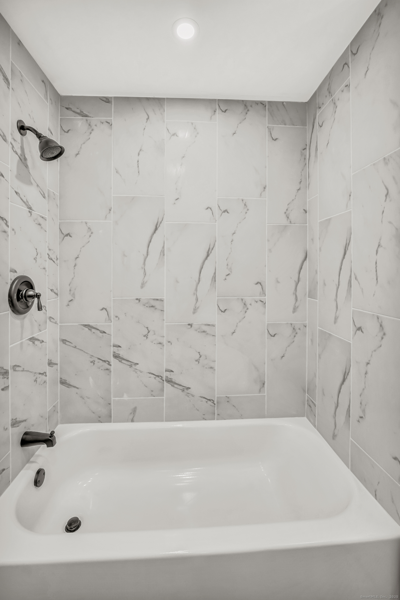 360 Old Sherman Hill Road Woodbury, CT 06798 - Photo 14 of 19 a bathroom with a bathtub and a shower