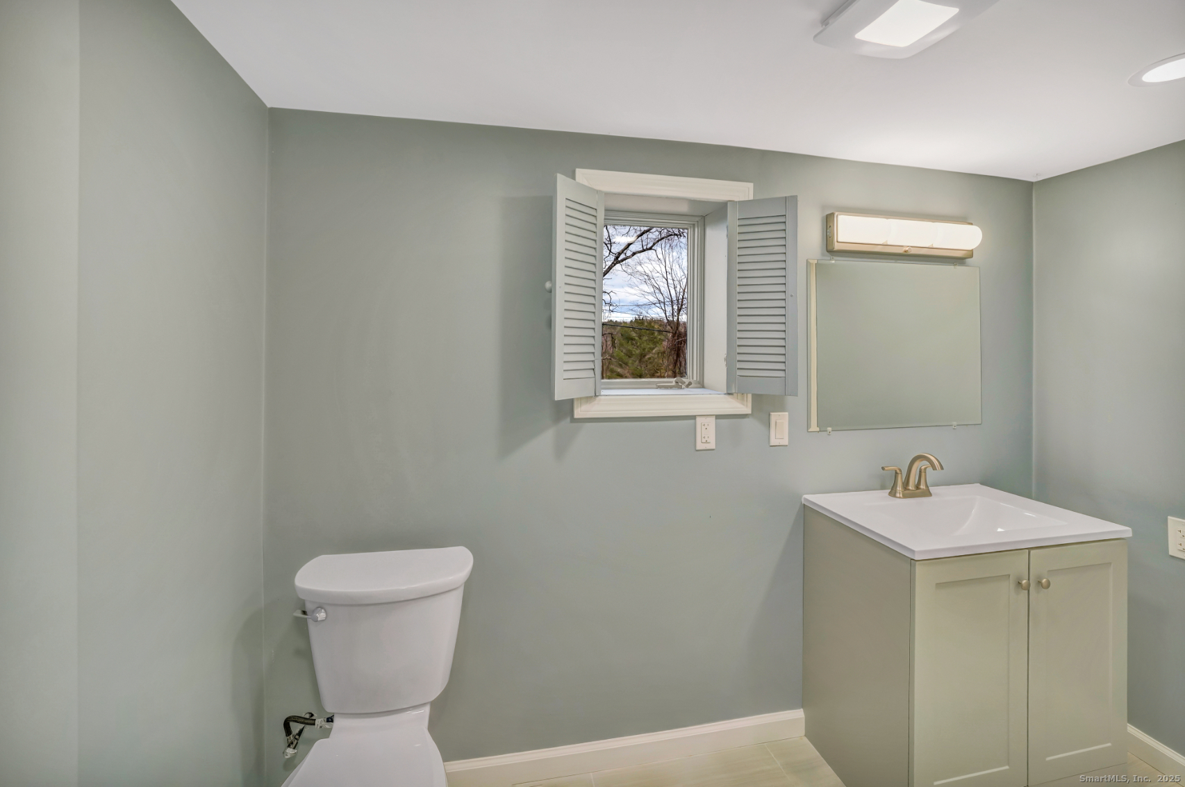 360 Old Sherman Hill Road Woodbury, CT 06798 - Photo 15 of 19 a bathroom with sink and toilet