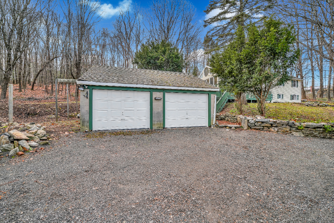 360 Old Sherman Hill Road Woodbury, CT 06798 - Photo 18 of 19 a house with a outdoor space