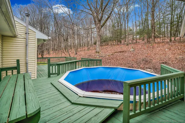 a view of a chairs on roof deck