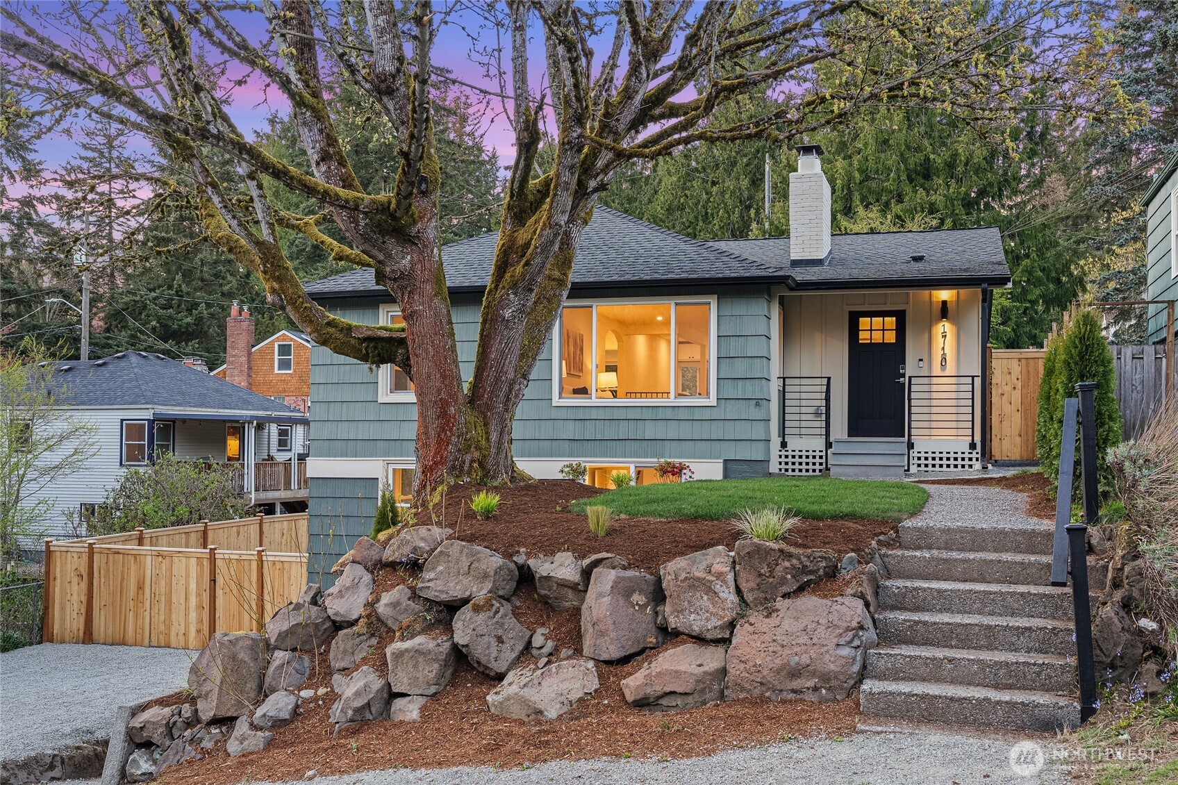 a front view of a house with garden