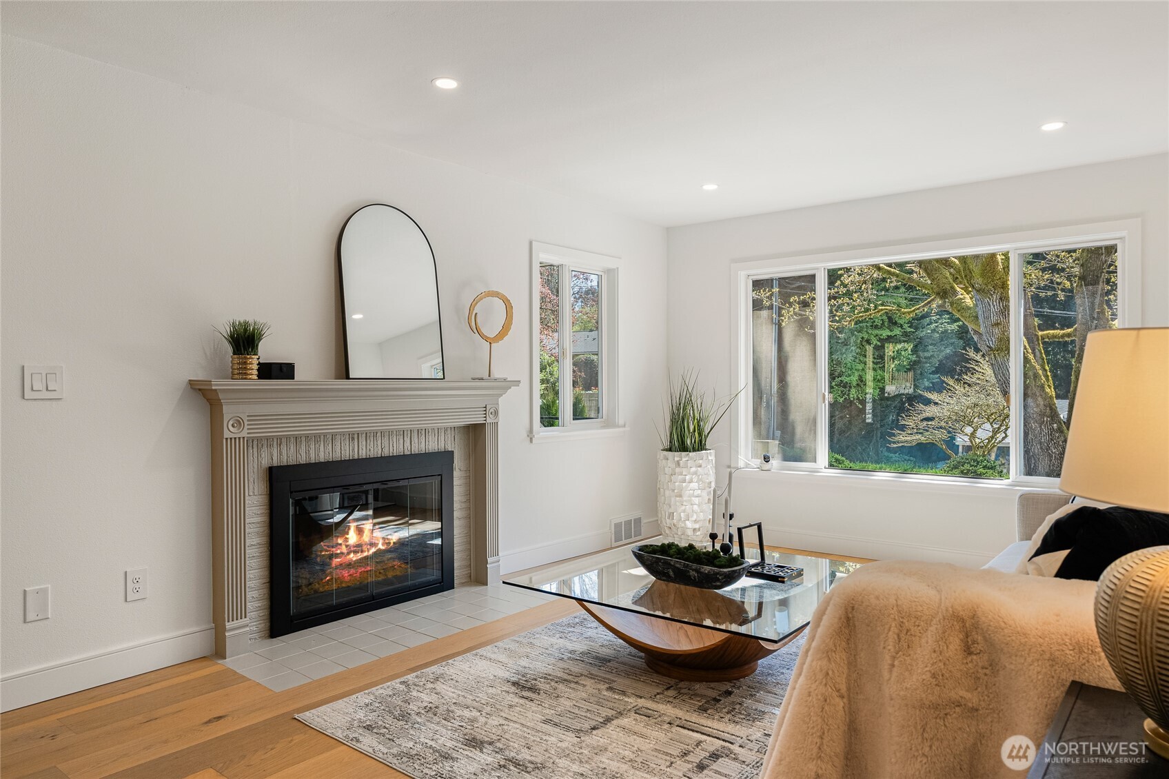 1710 Northeast 104th Street Seattle, WA 98125 - Photo 16 of 40 a living room with furniture and a fireplace