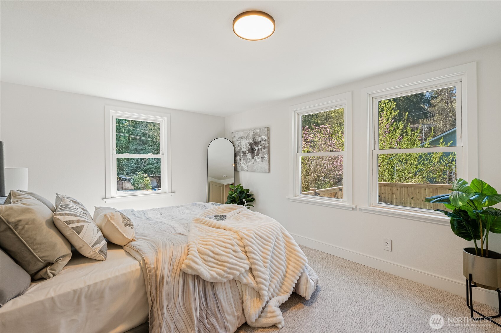 1710 Northeast 104th Street Seattle, WA 98125 - Photo 26 of 40 a bedroom with a bed and a window