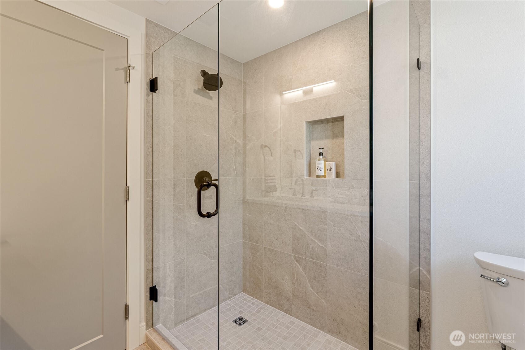 1710 Northeast 104th Street Seattle, WA 98125 - Photo 29 of 40 a bathroom with a shower and a sink