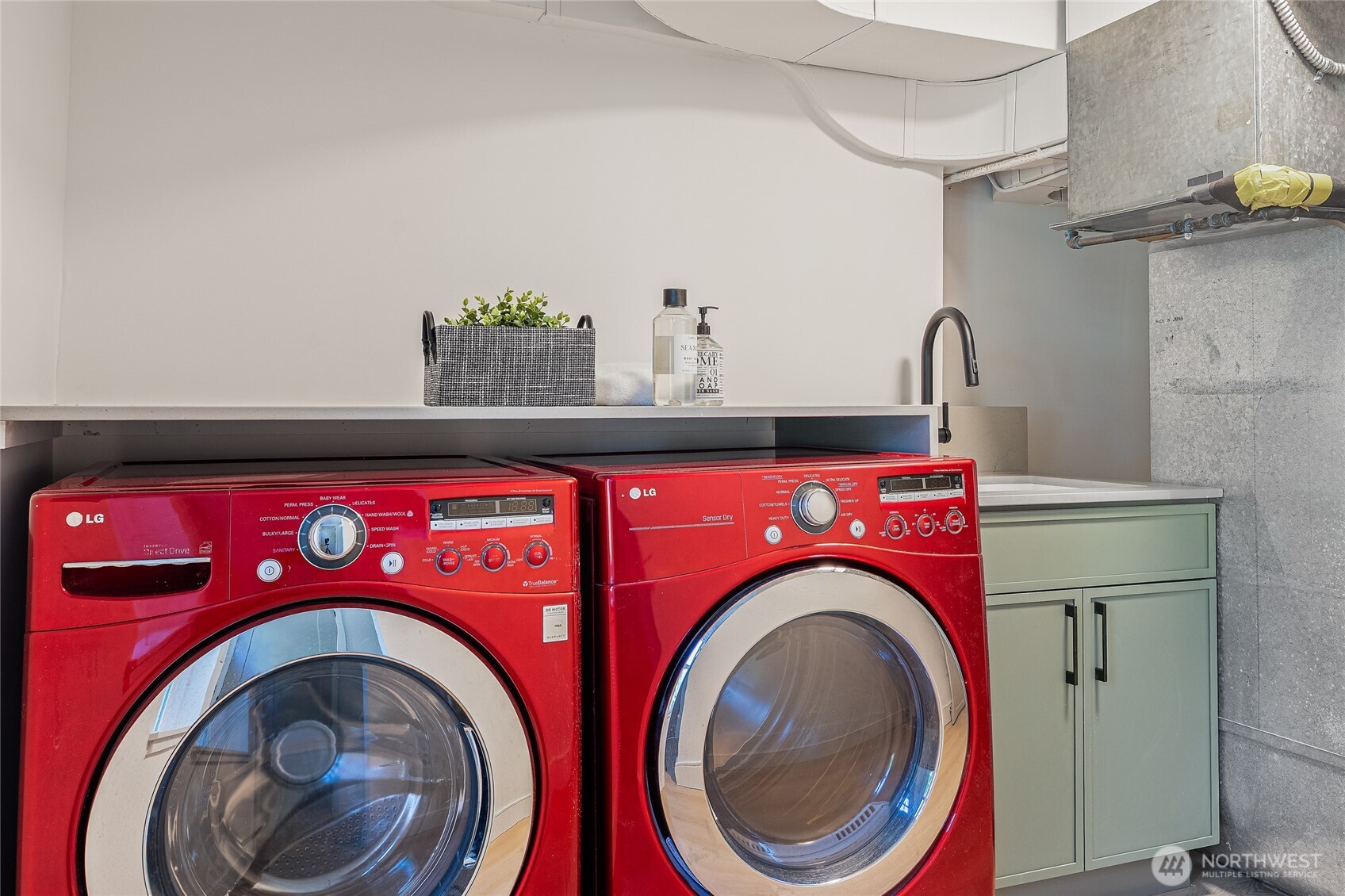 1710 Northeast 104th Street Seattle, WA 98125 - Photo 31 of 40 a utility room with dryer and washer