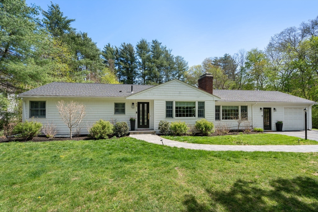 54 Red Barn Road Wayland, MA 01778 - Photo 1 of 2 a front view of a house with a yard and porch