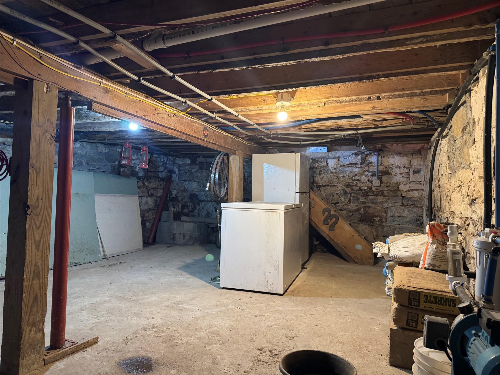 50 Hamilton Road Bloomingburg, NY 12721 - Photo 21 of 33 Unfinished basement with fridge