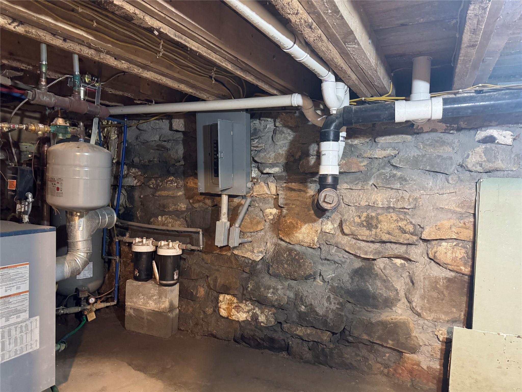 50 Hamilton Road Bloomingburg, NY 12721 - Photo 22 of 33 Utility room with electric panel and a heating unit