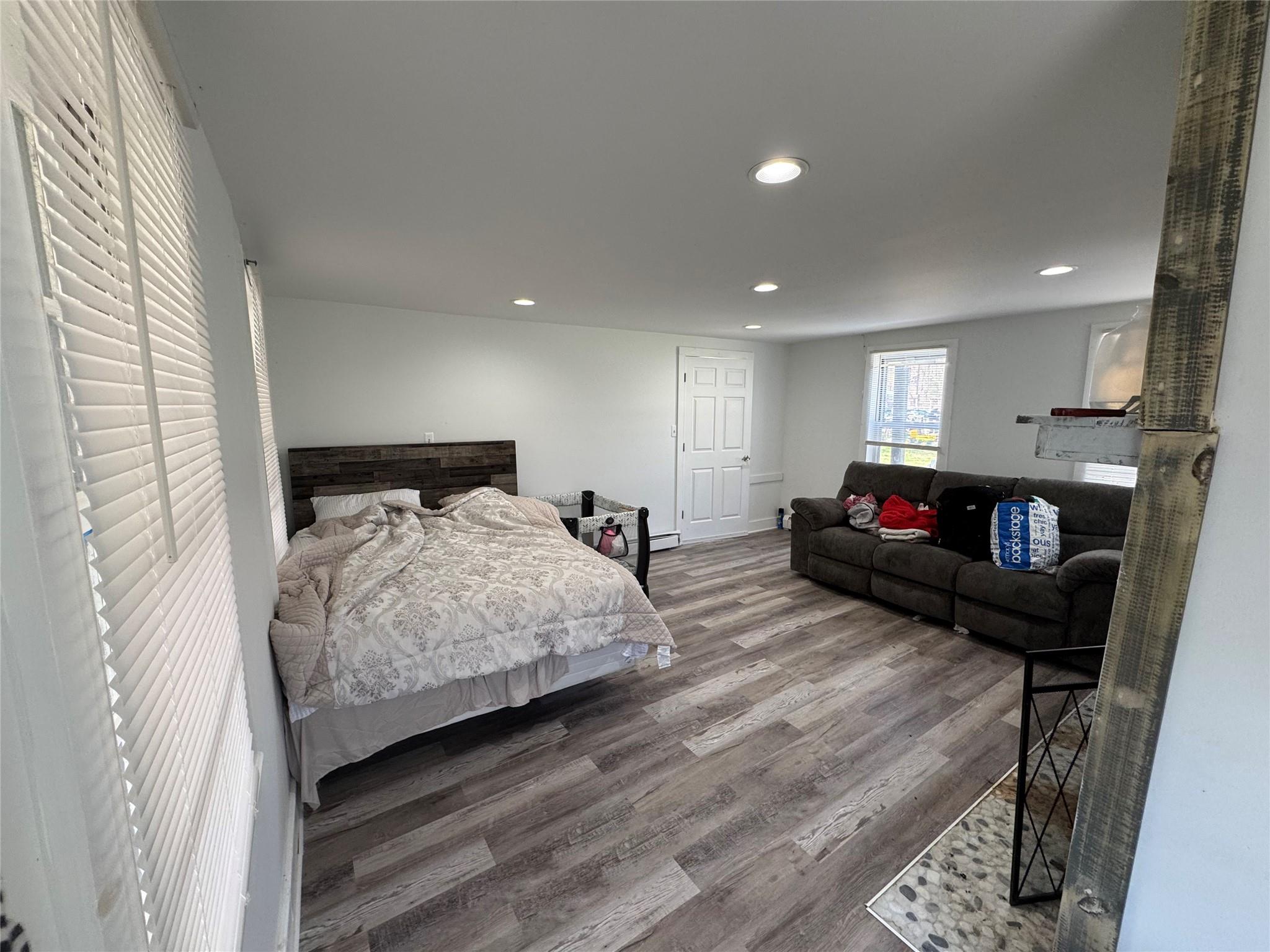 50 Hamilton Road Bloomingburg, NY 12721 - Photo 6 of 33 Bedroom featuring wood finished floors and recessed lighting