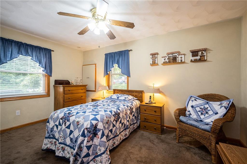 6050 Poketa Road Verona, PA 15147 - Photo 12 of 25 First floor master bedroom is ample in size and measures 15x12!