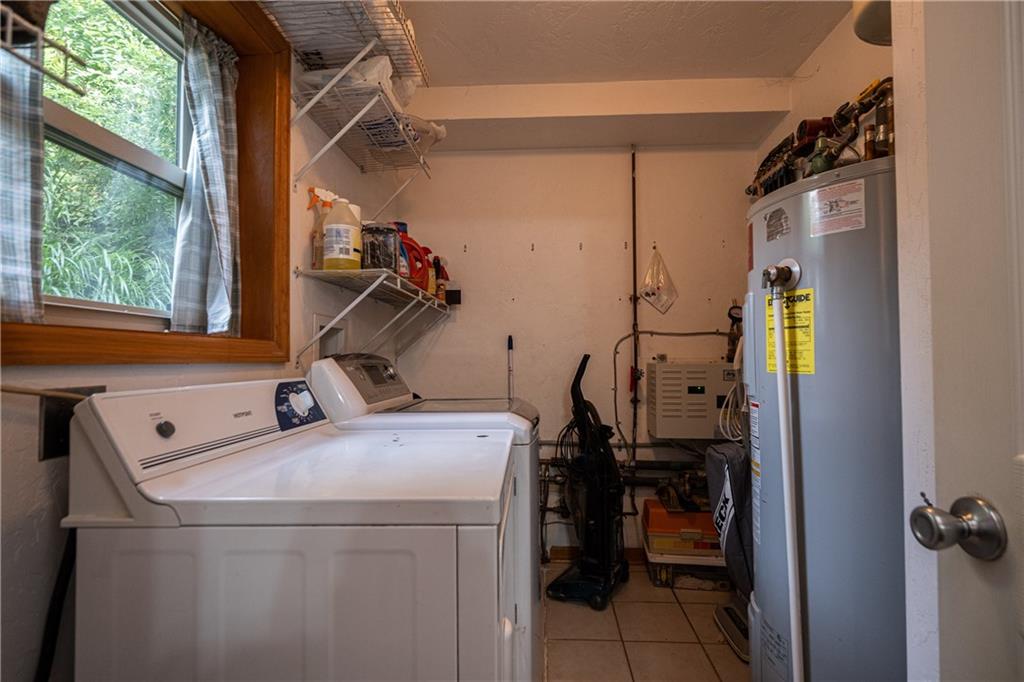 6050 Poketa Road Verona, PA 15147 - Photo 22 of 25 Main floor laundry for the ultimate convenience.