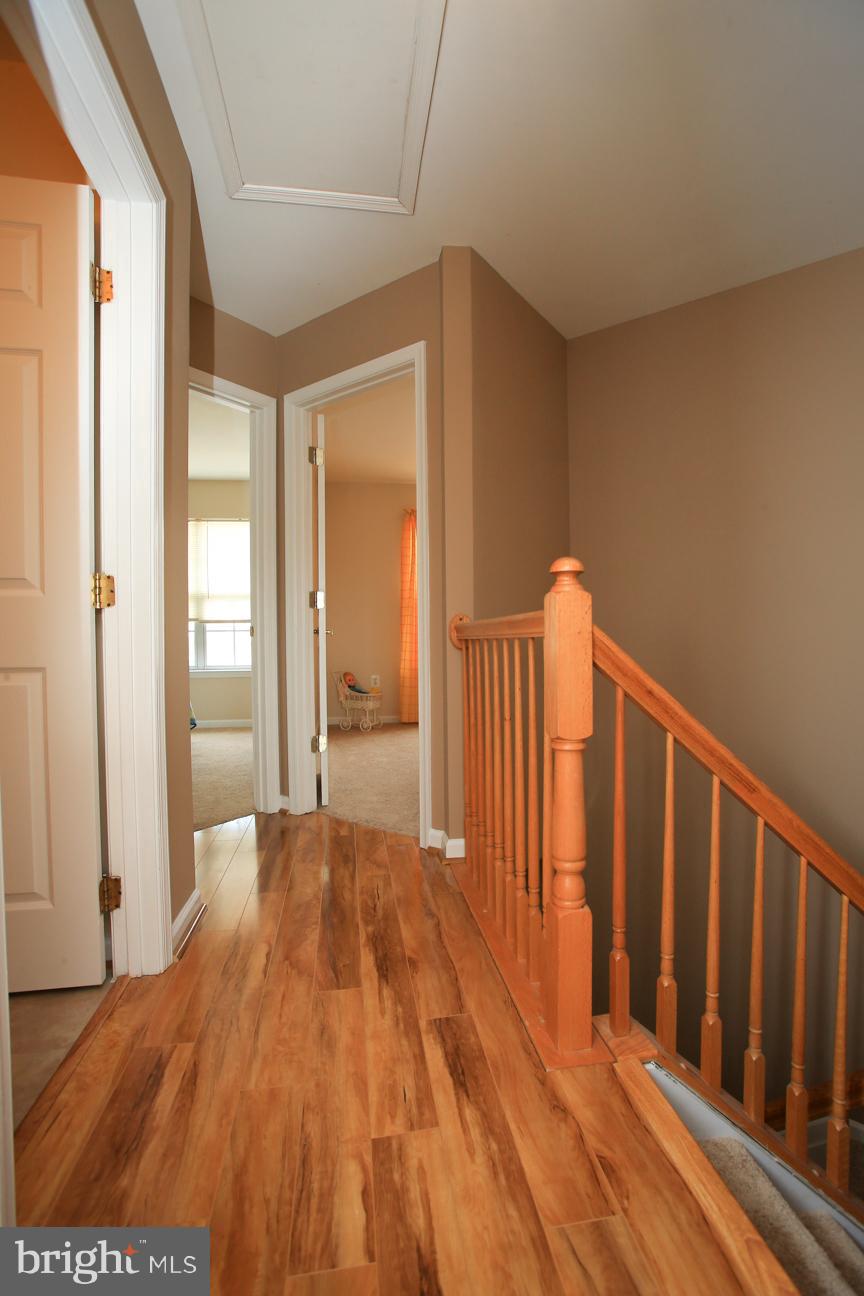 6106 Pine Ridge Terrace Frederick, MD 21701 - Photo 18 of 29 Laminate Hallway on Upper feels light and airy
