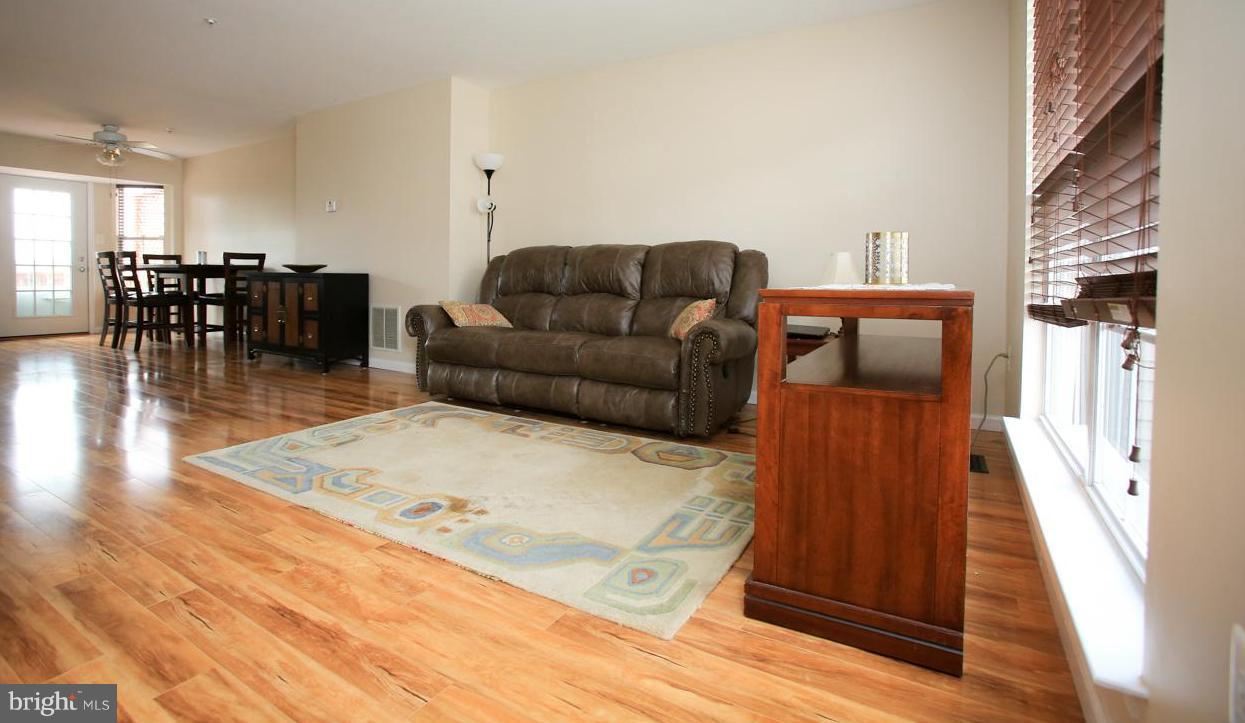 6106 Pine Ridge Terrace Frederick, MD 21701 - Photo 3 of 29 Bright and airy with wood laminate flooring