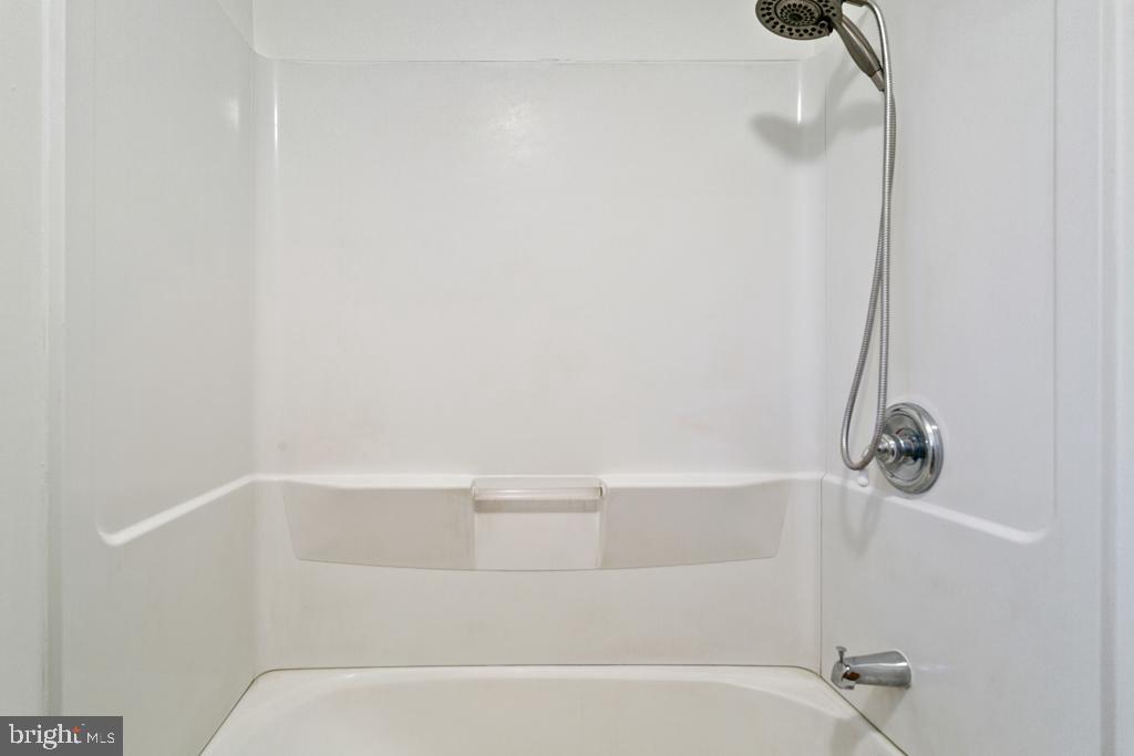 9 Oberlin Road Pennsville, NJ 08070 - Photo 12 of 23 a bathroom with a bathtub