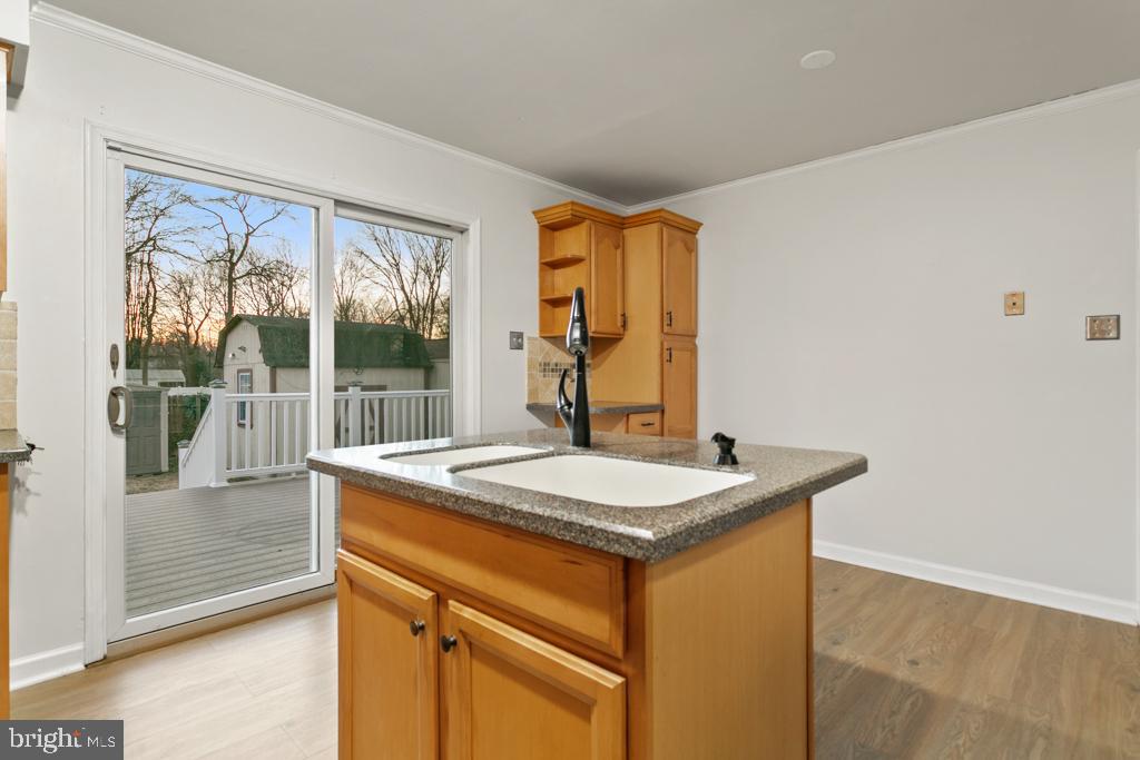 9 Oberlin Road Pennsville, NJ 08070 - Photo 6 of 23 a bathroom with a sink and a vanity
